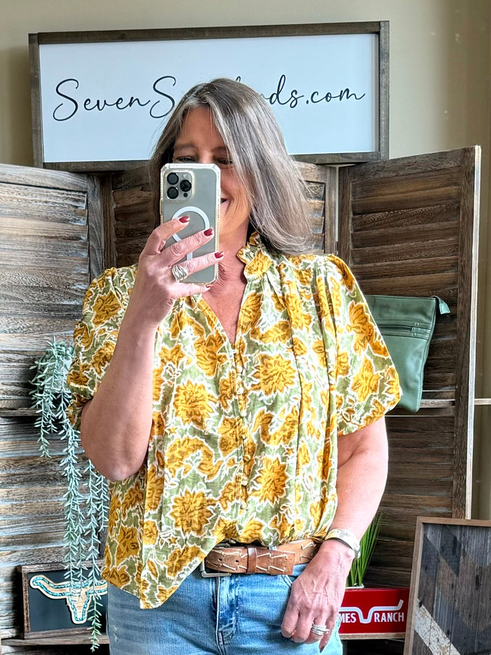Mustard floral blouse with short puff sleeves and button front