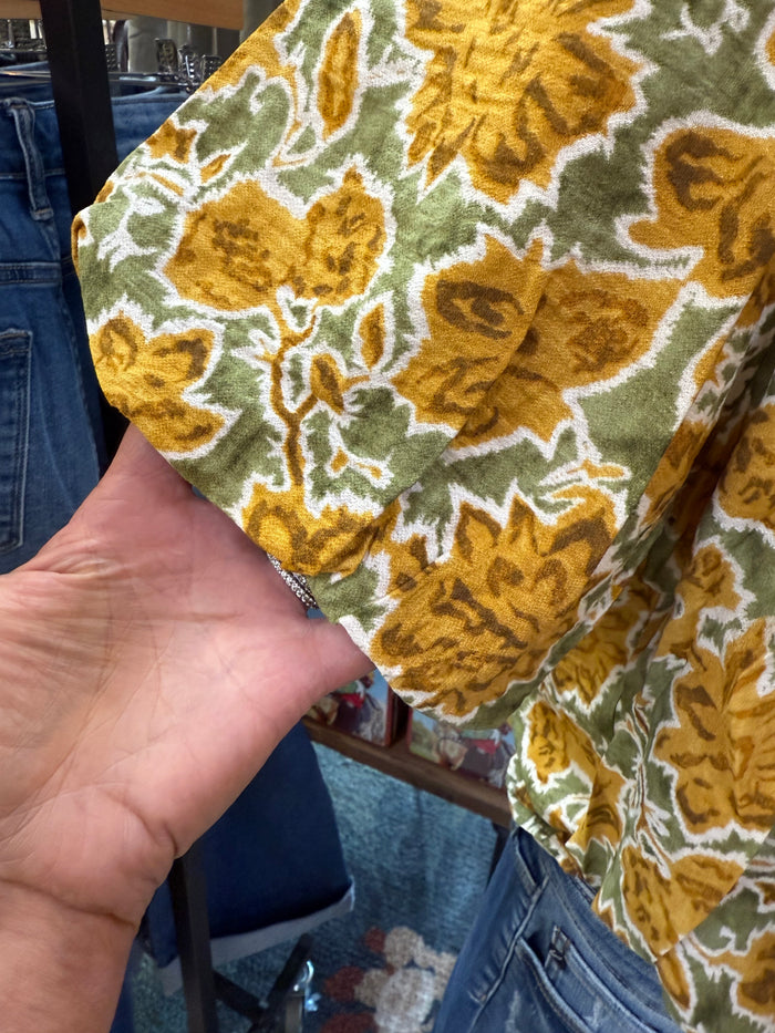 Floral short-sleeve shirt in mustard, green, and cream with dense pattern