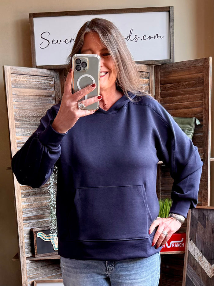 Navy pullover hoodie sweatshirt with hood and kangaroo pocket, side view