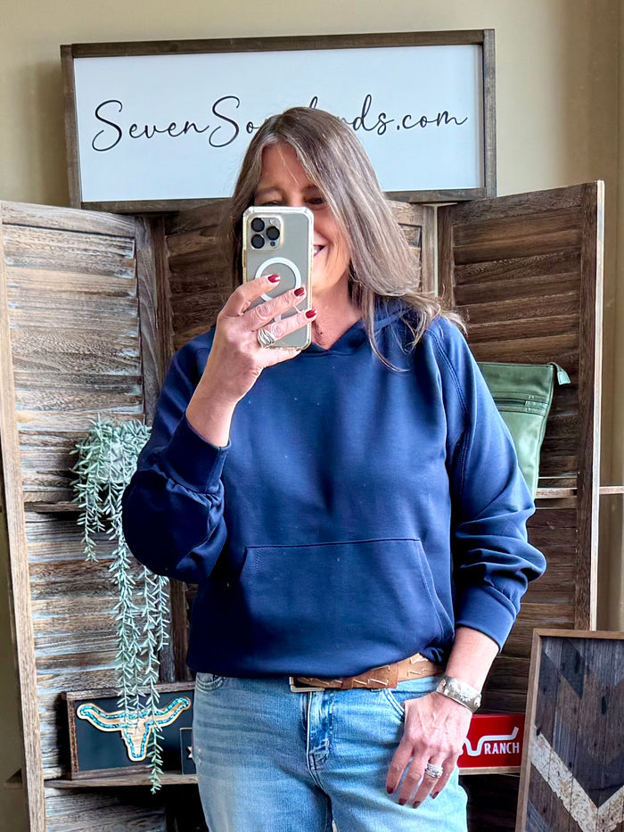 Navy pullover hoodie sweatshirt with front kangaroo pocket and long sleeves