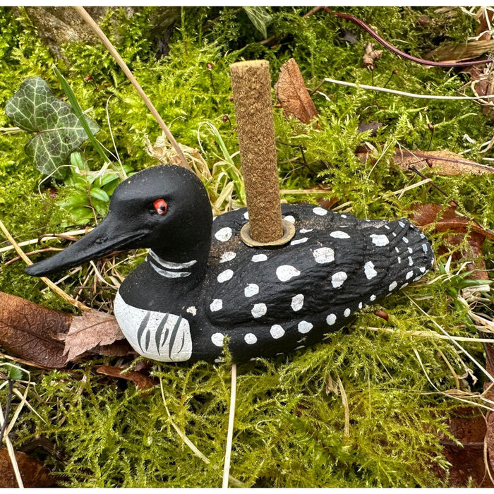 PAINES Incense Loon Holder features balsam fir incense sticks on moss, filling your home with natural woodland fragrance.