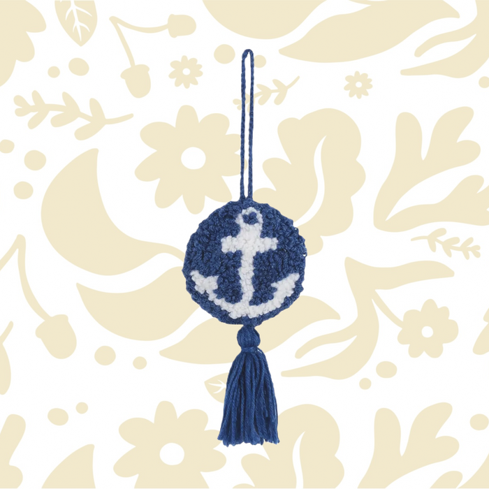 The Peking Handicraft Hanging Anchor Decoration features a blue crochet tassel with a white anchor design in the center, attached by a blue string loop and equipped with a poly hook for easy hanging.