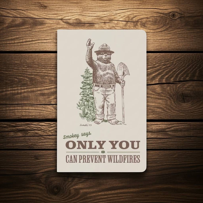 Forager Provisions LTD Smokey Bear letterpress notebook with a vintage illustration on a recycled paper cover.