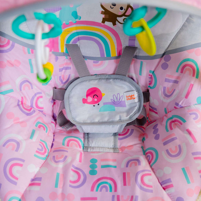 Bright Starts Pink Paradise Portable Swing with interactive toys and adjustable recline for babies