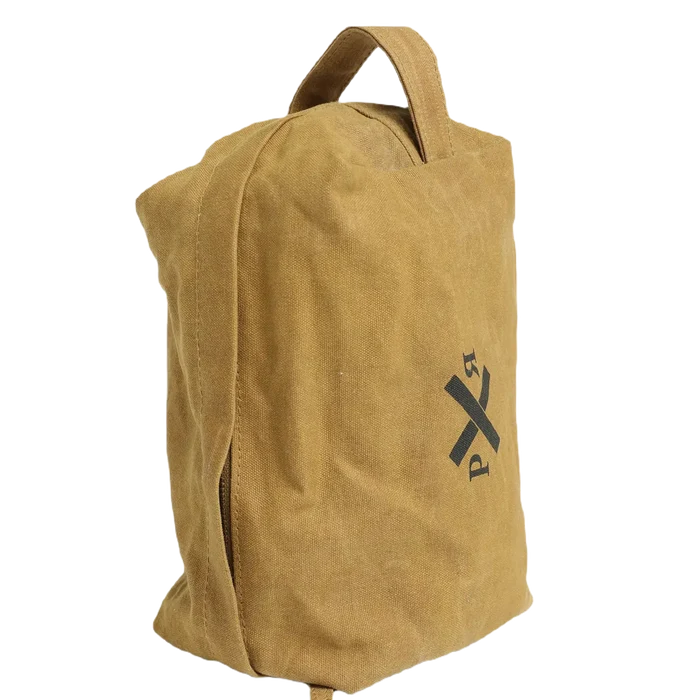 The Pony Rider Slow Road Waxed Canvas Toiletry Bag - Clay is a tan canvas bag featuring a black logo with a compass and the letters "P" and "R." Made in India, it also includes a convenient handle on top.