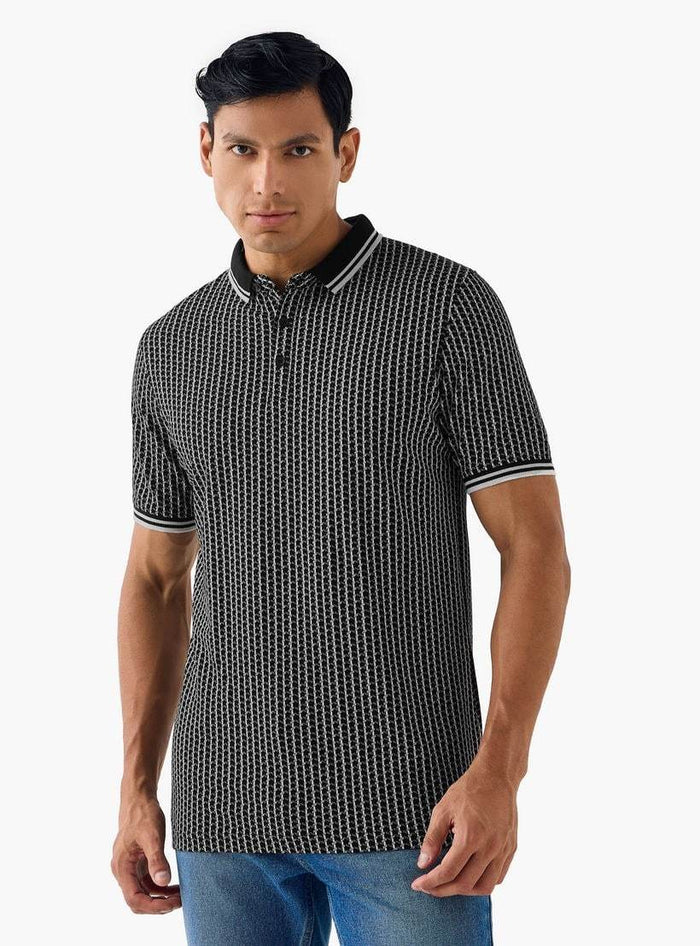 Folded men’s printed polo t-shirt flatlay UAE - 604