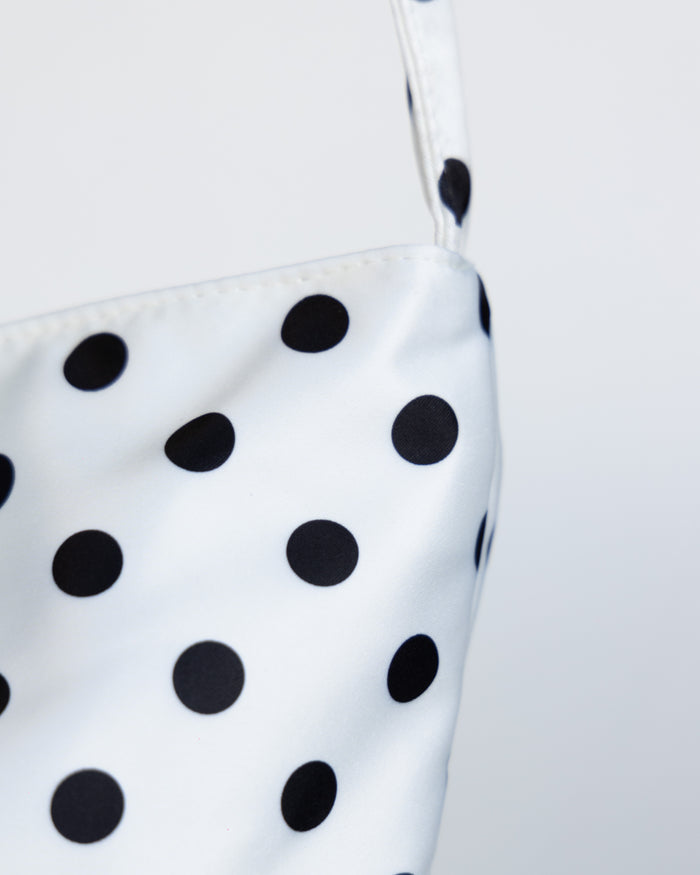 spotted hand bag