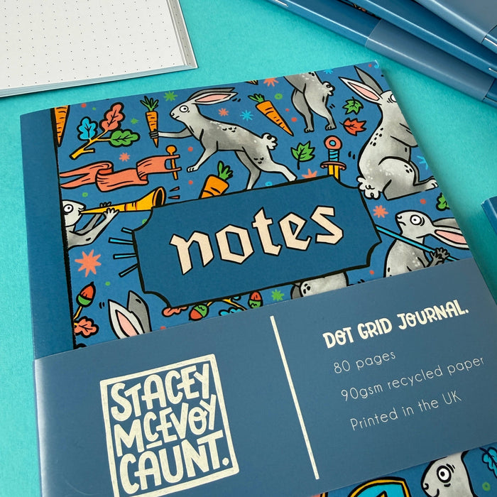 Forager Provisions LTD Stacey McEvoy Caunt A5 dot grid notebook featuring a medieval duelling bunnies cover design
