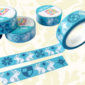 Stacey McEvoy Caunt Medieval Rabbit Tile Washi Tape rolls on dotted paper, with blue pens—planner and journaling supplies.