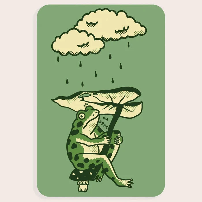 Stay Home Club Leaf Umbrella Vinyl Sticker with cute frog on mushroom, sheltered by leaf—perfect rainy day aesthetic decor.