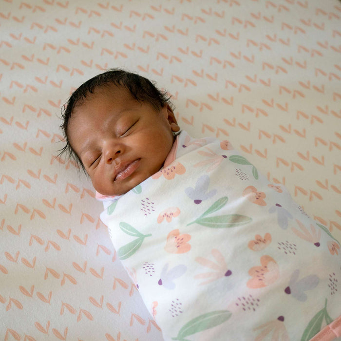SwaddleMe by Ingenuity adjustable easy-wrap baby swaddle set in floral pattern for newborns to 3 months