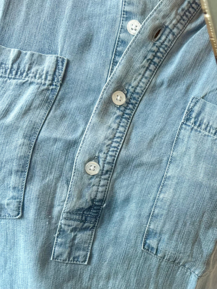 Light blue Tencel pullover shirt close-up: button placket and chest pocket