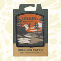 Forager Provisions LTD Everglades National Park iron-on patch featuring a sunset landscape with trees and a bird