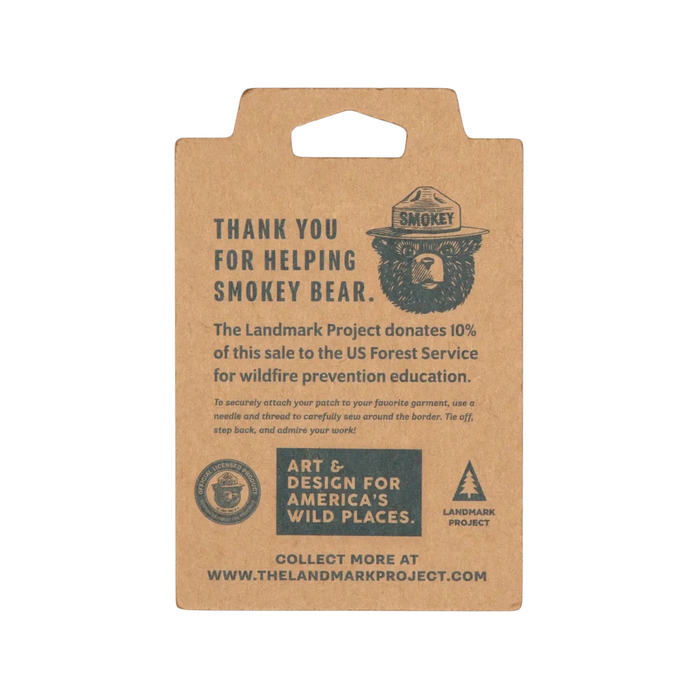 Forager Provisions LTD The Landmark Project Smokey Bear patch cardboard backing with wildfire prevention information.