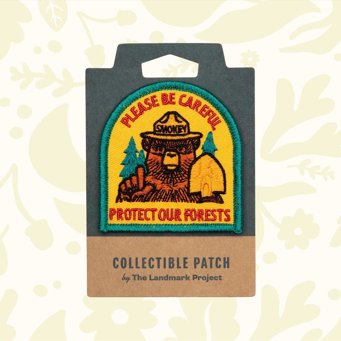 Forager Provisions LTD embroidered Smokey Bear patch featuring Please Be Careful Protect Our Forests text in yellow