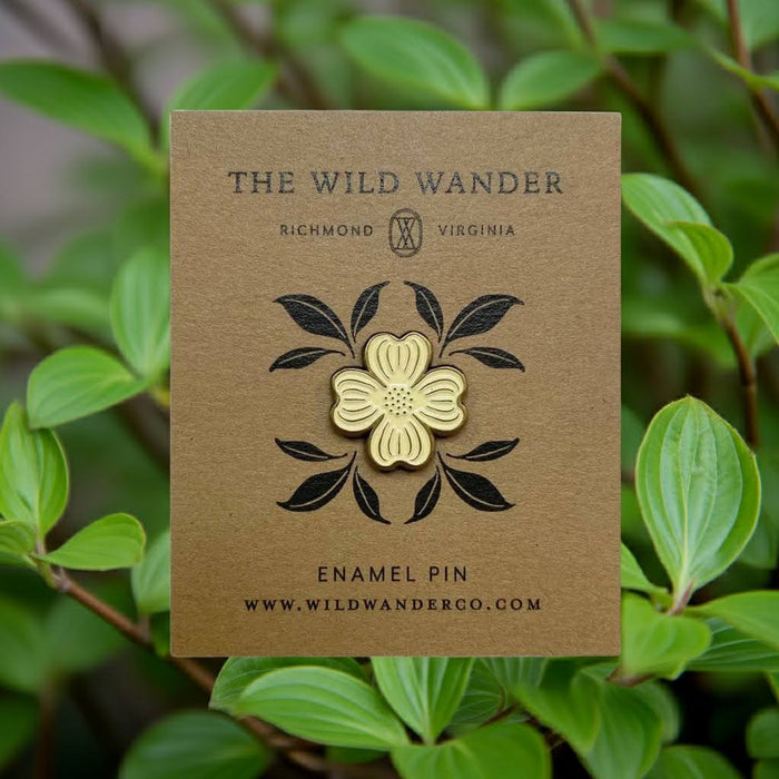 Forager Provisions LTD The Wild Wander ivory dogwood enamel pin with antique gold accents on a kraft backing card.