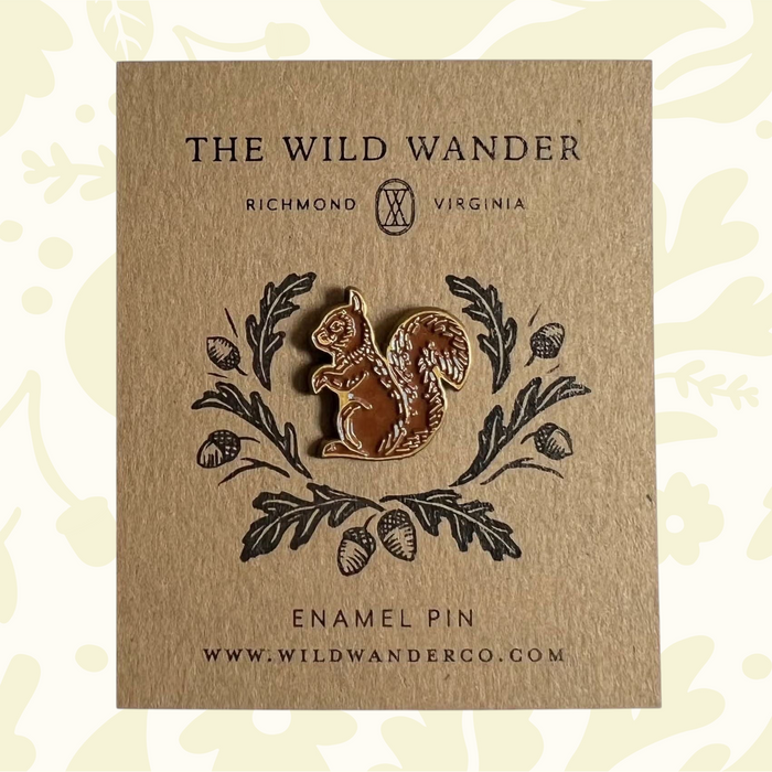 Forager Provisions LTD red squirrel enamel pin with antique gold accents on an illustrated kraft backing card