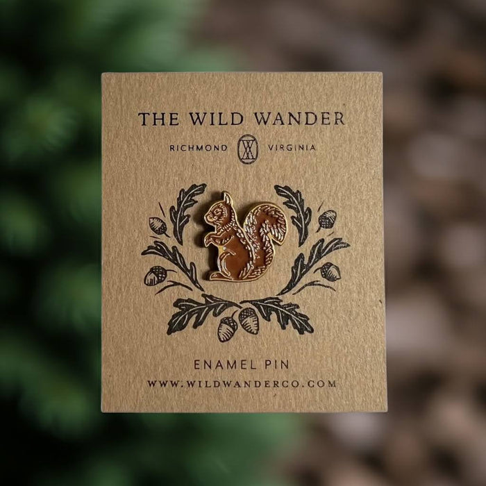 Forager Provisions LTD red squirrel enamel pin with antique gold accents on an illustrated kraft backing card
