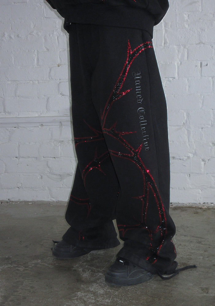 THORN RHINESTONE SWEATPANTS BLACK AND RED