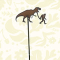 Forager Provisions LTD rustic steel plant stake featuring a silhouette of Bigfoot walking with a T-Rex dinosaur.