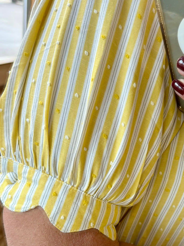 Yellow and white striped fabric with small dot pattern, gathered short puff sleeve