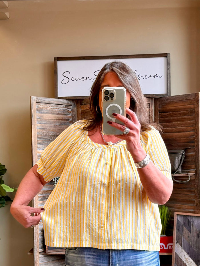 Yellow and white striped short-sleeve shirt with small dotted accents and gathered neckline